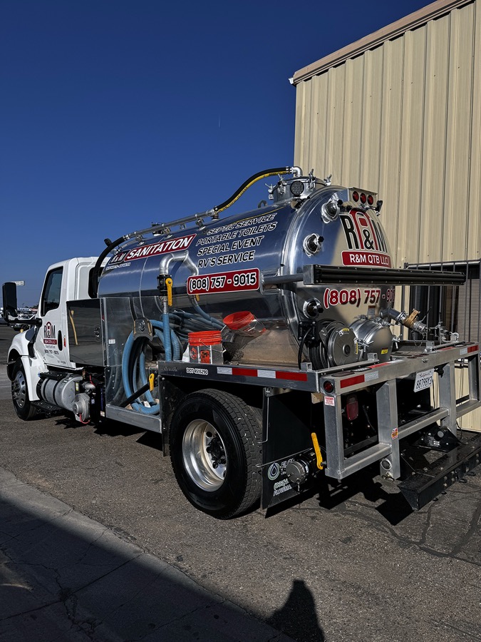 RM Sanitation rear vacuum tank lettering